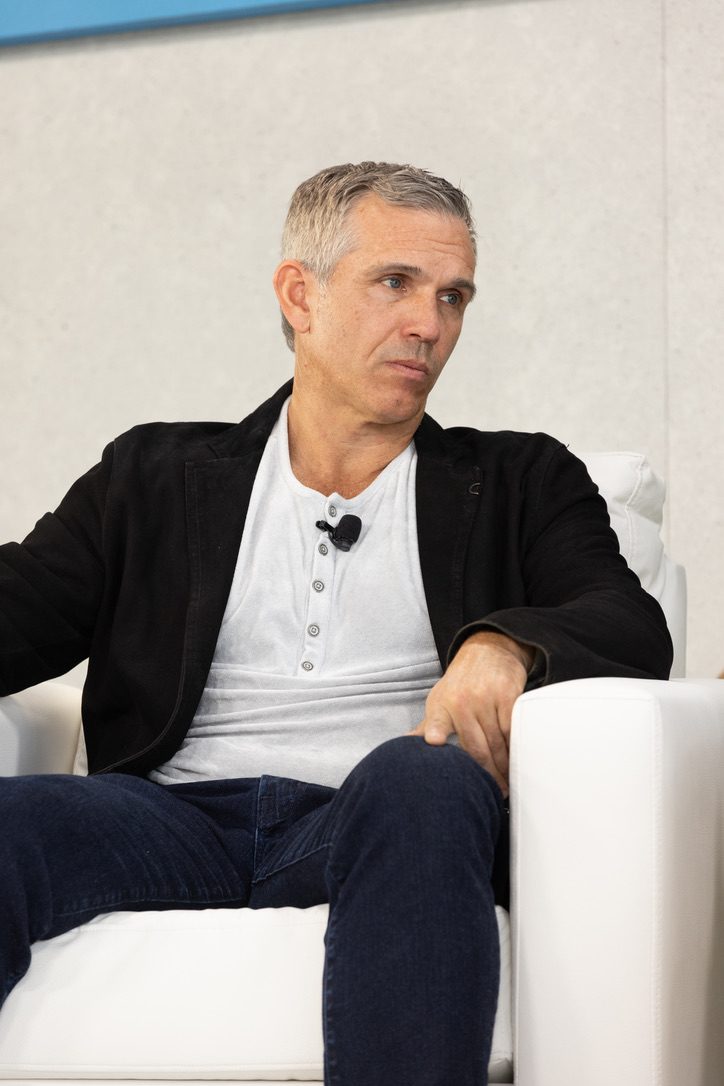 Dave Cole on stage during a panel